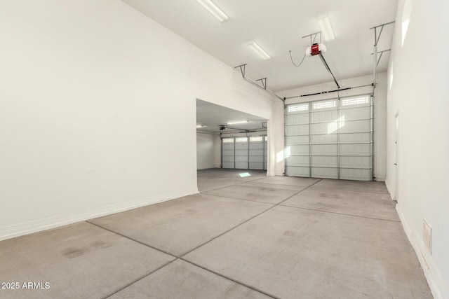 18108 W Cassia Way, Goodyear, AZ 85338 - garage with a garage door opener and baseboards