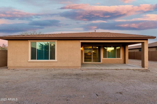 18108 W Cassia Way, Goodyear, AZ 85338 - rear view of house with a patio and stucco siding