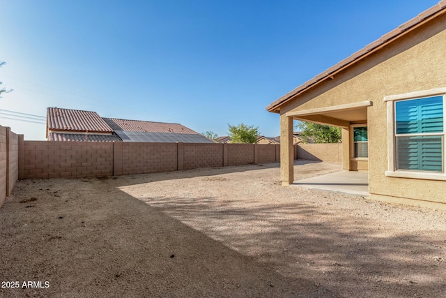 18108 W Cassia Way, Goodyear, AZ 85338 - fenced backyard with a patio area