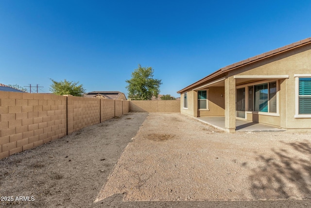 18108 W Cassia Way, Goodyear, AZ 85338 - fenced backyard featuring a patio