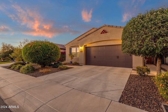 view of front of property featuring a garage