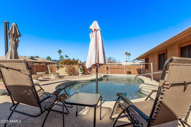 view of pool with a patio area