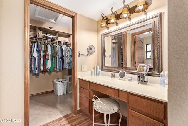 bathroom with vanity and tile patterned flooring