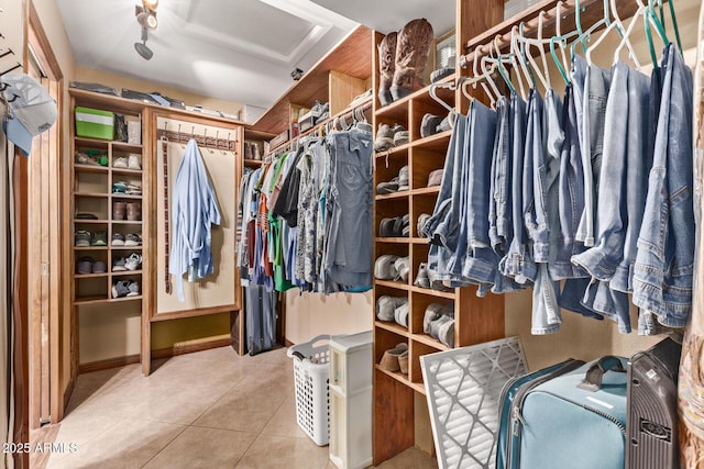 spacious closet featuring tile patterned floors