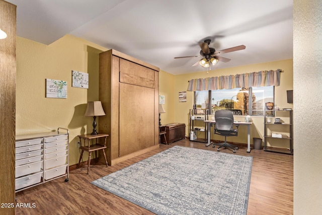 office area featuring hardwood / wood-style flooring and ceiling fan