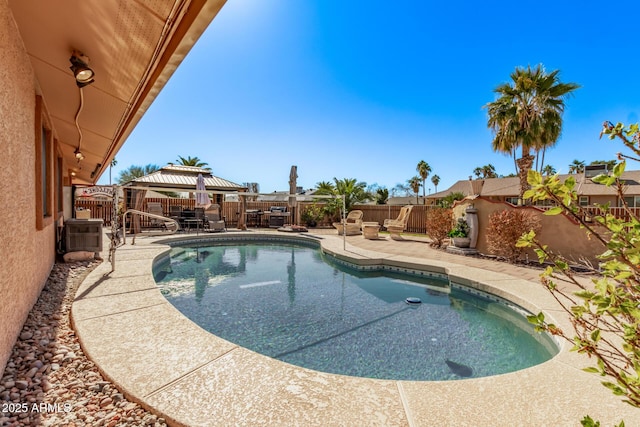 view of pool featuring a gazebo, a patio area, and central AC