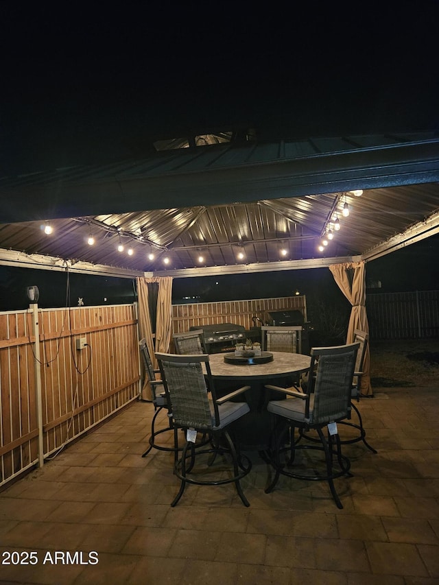 patio at night with a gazebo