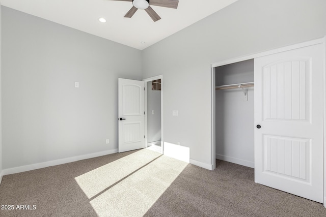 unfurnished bedroom with ceiling fan, a closet, and carpet