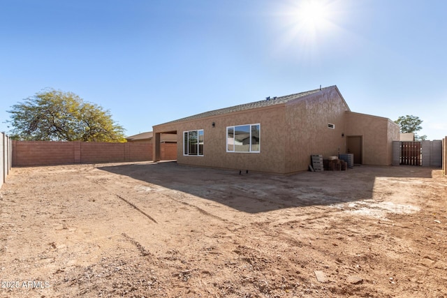 back of property with cooling unit