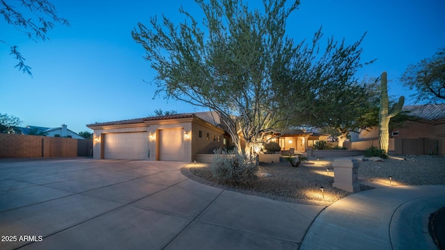 view of front of property featuring a garage