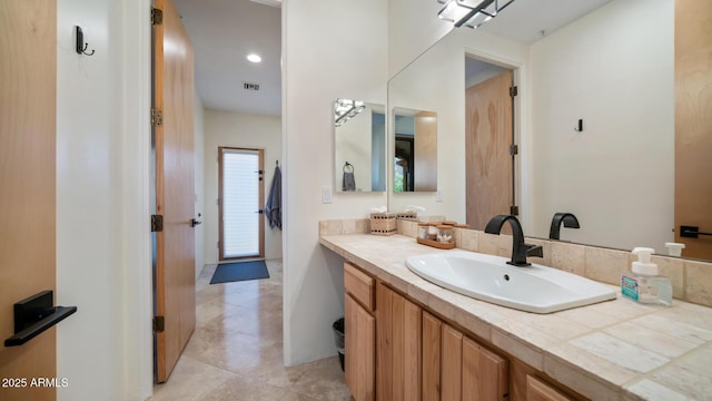 bathroom featuring vanity and tile patterned floors