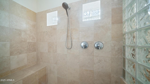 bathroom featuring tiled shower