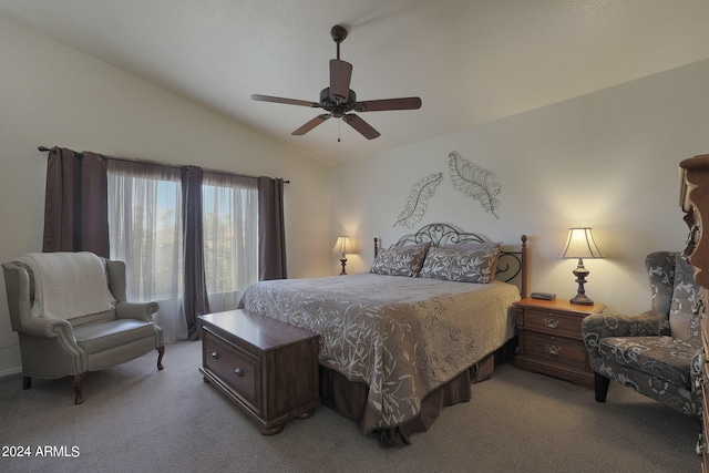 carpeted bedroom featuring lofted ceiling and ceiling fan