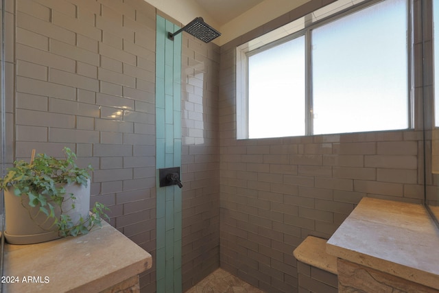 bathroom featuring tiled shower