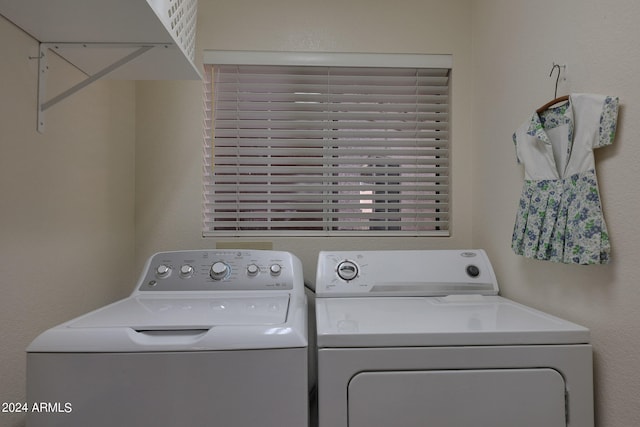 laundry area featuring washer and clothes dryer