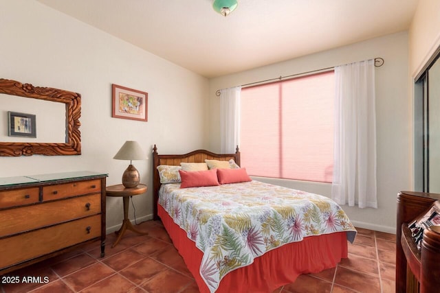 43014 N 12th St, New River, AZ 85087 - tiled bedroom featuring baseboards