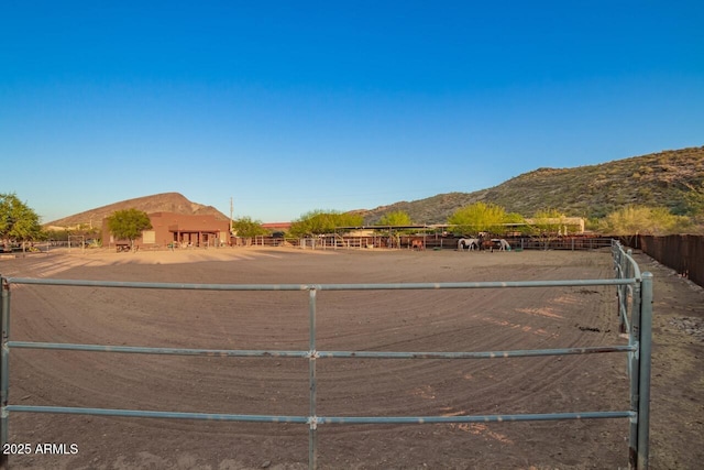 43014 N 12th St, New River, AZ 85087 - view of yard featuring a mountain view, an enclosed horse arena, and fence