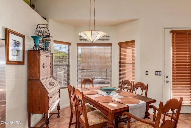 43014 N 12th St, New River, AZ 85087 - dining room featuring light tile patterned floors and baseboards