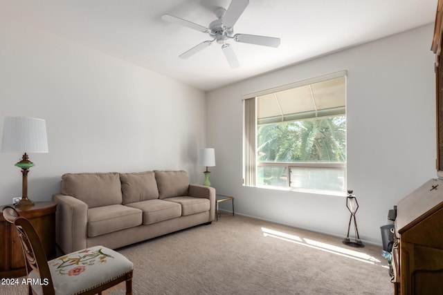 living room featuring ceiling fan and carpet flooring