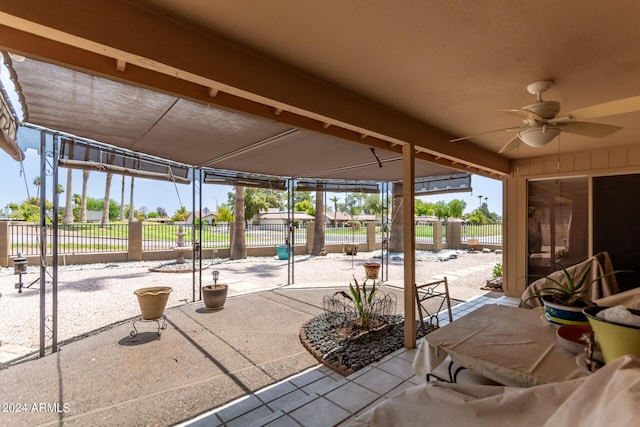 view of patio / terrace featuring ceiling fan