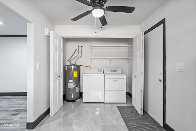 laundry area with electric water heater, washing machine and clothes dryer, and ceiling fan