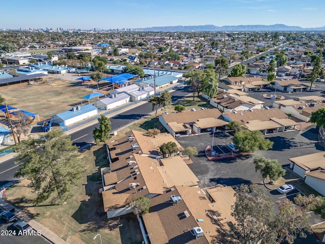 drone / aerial view featuring a mountain view