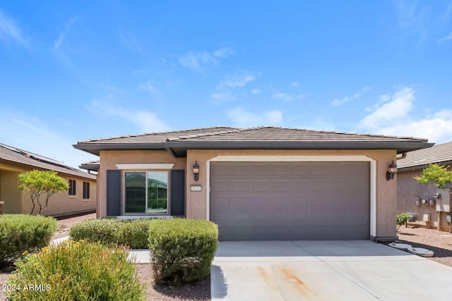 prairie-style home with a garage