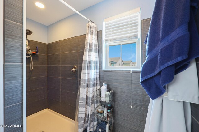 bathroom featuring walk in shower