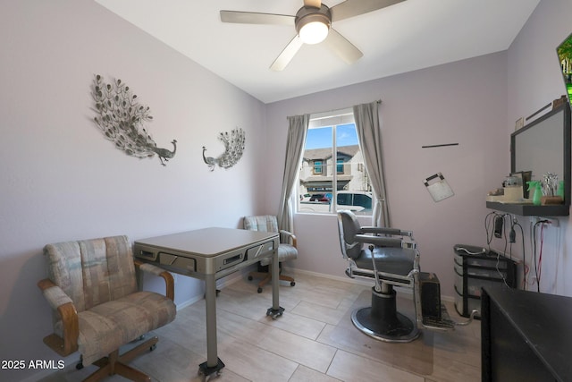 tiled home office with ceiling fan