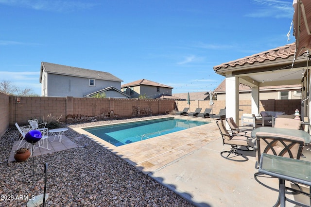 view of pool with a patio