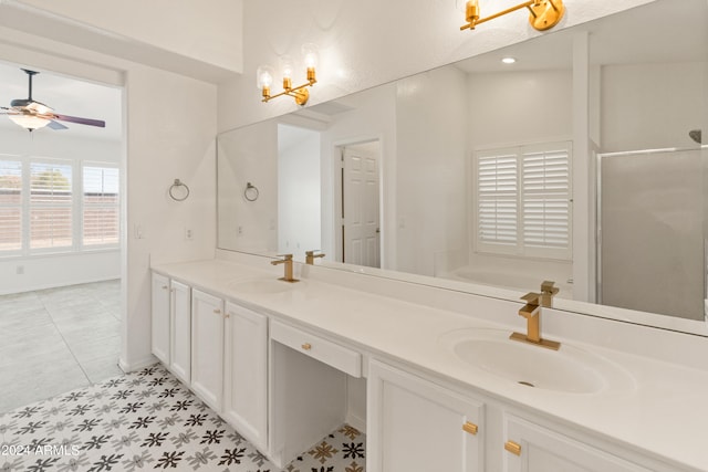 bathroom with vanity, separate shower and tub, and ceiling fan