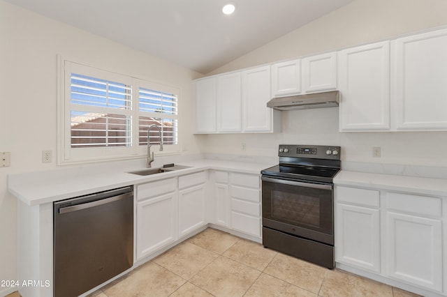 kitchen with light tile patterned flooring, sink, white cabinets, lofted ceiling, and appliances with stainless steel finishes