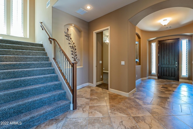 4120 E Woodside Way, Gilbert, AZ 85297 - foyer with arched walkways and stairway