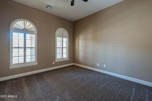 4120 E Woodside Way, Gilbert, AZ 85297 - empty room featuring a ceiling fan and dark carpet