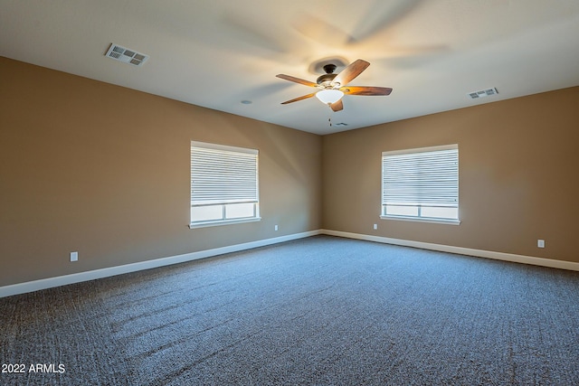 4120 E Woodside Way, Gilbert, AZ 85297 - spare room featuring dark colored carpet and ceiling fan