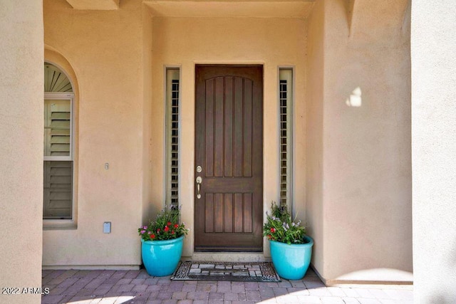 4120 E Woodside Way, Gilbert, AZ 85297 - doorway to property with stucco siding