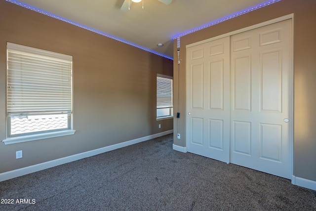 4120 E Woodside Way, Gilbert, AZ 85297 - unfurnished bedroom with dark carpet and a closet