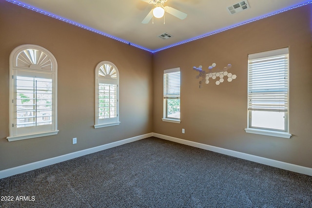 4120 E Woodside Way, Gilbert, AZ 85297 - spare room featuring dark colored carpet, a ceiling fan, and ornamental molding