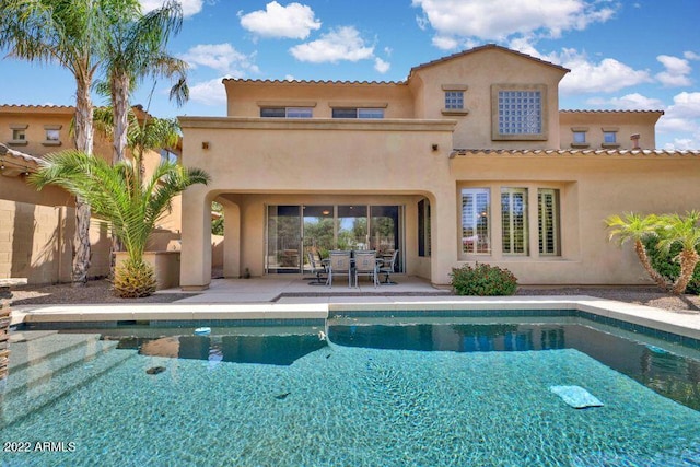 4120 E Woodside Way, Gilbert, AZ 85297 - back of house with stucco siding, an outdoor pool, a patio, and outdoor dining space