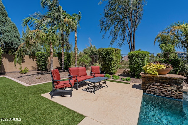4120 E Woodside Way, Gilbert, AZ 85297 - fenced backyard featuring outdoor lounge area and a patio