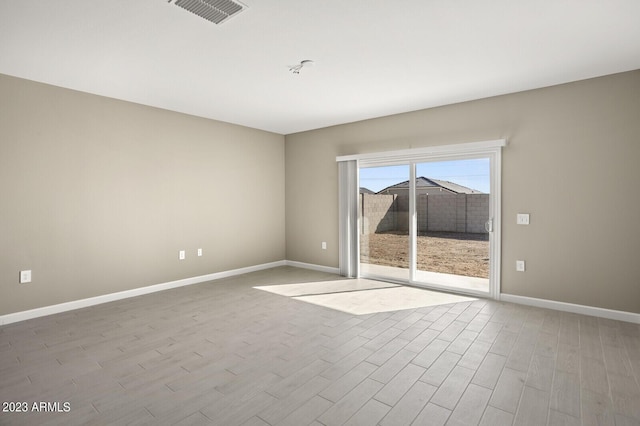 1471 S 239th Dr, Buckeye, AZ 85326 - empty room with wood finished floors and baseboards