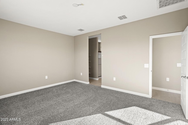1471 S 239th Dr, Buckeye, AZ 85326 - unfurnished bedroom featuring carpet floors and baseboards