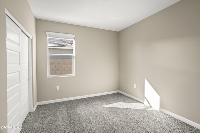 1471 S 239th Dr, Buckeye, AZ 85326 - unfurnished bedroom featuring baseboards and carpet flooring