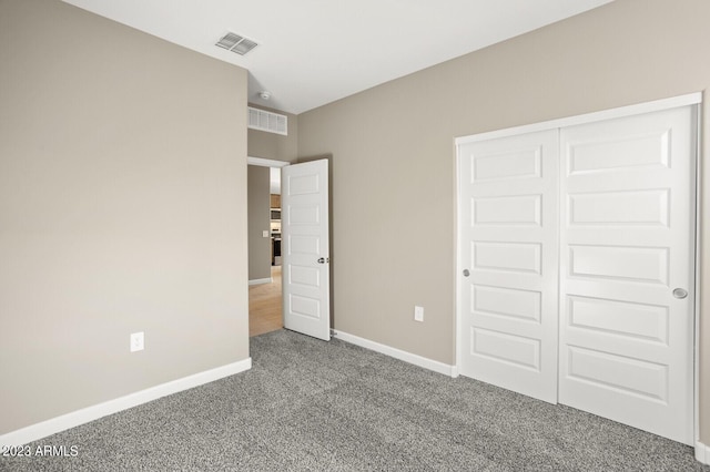 1471 S 239th Dr, Buckeye, AZ 85326 - unfurnished bedroom featuring carpet flooring, baseboards, and a closet