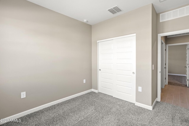 1471 S 239th Dr, Buckeye, AZ 85326 - unfurnished bedroom with carpet, baseboards, and a closet
