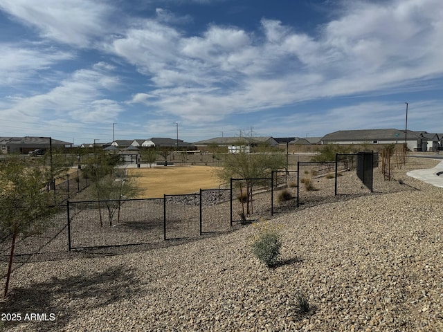 view of yard with a gate and fence