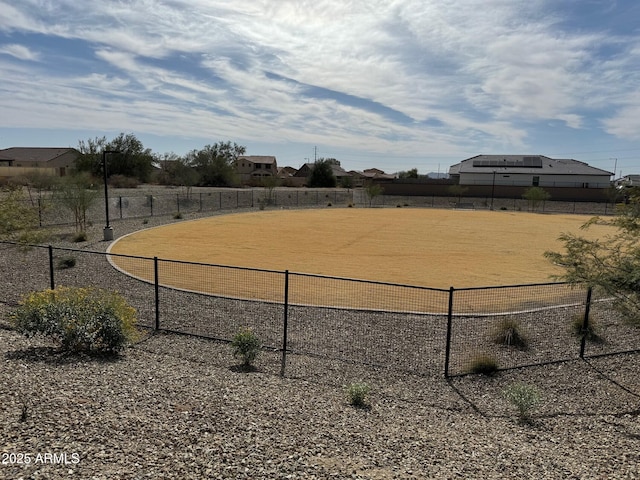 view of community with an enclosed area and fence