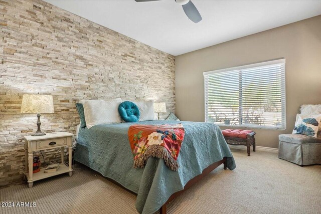 bedroom featuring carpet flooring and ceiling fan