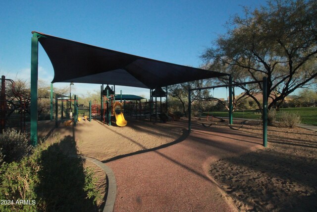 surrounding community featuring a playground