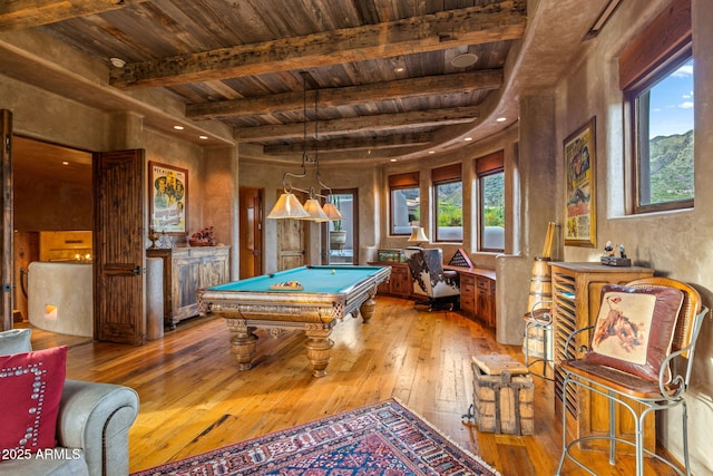 game room with beamed ceiling, billiards, light hardwood / wood-style floors, and wooden ceiling